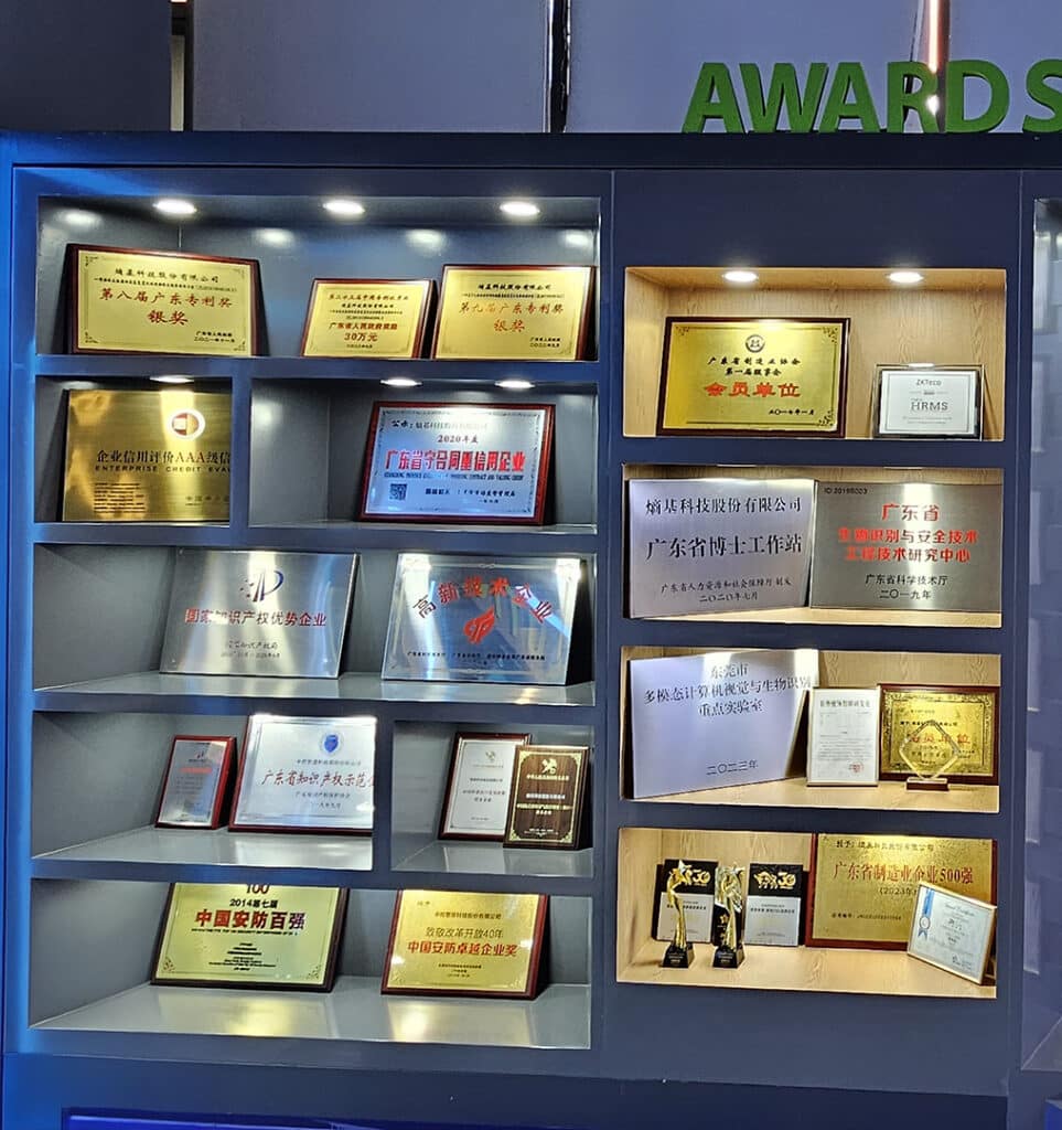 Awards display wall showcasing various recognitions and accolades earned by ZKTeco for excellence in technology and innovation.