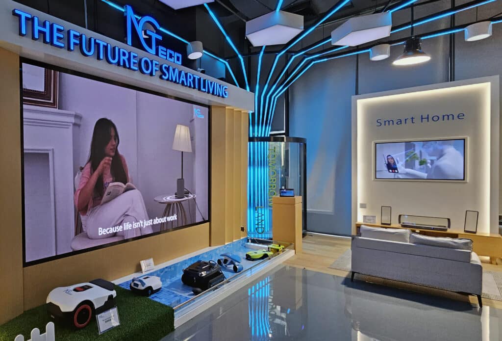 Showcase of NGTeco's Smart IoT products for smart living, featuring robotic devices and a smart home setup emphasizing the future of connected living.