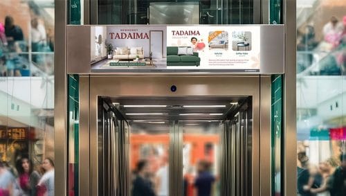 ZKDigimax DG01-A1P12AIO LED AI digital signage at a retail lift lobby