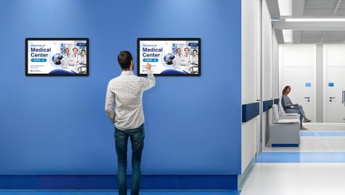 ZKDigimax AI wall-mounted digital signage DG03-A4W22 for healthcare visitor communication